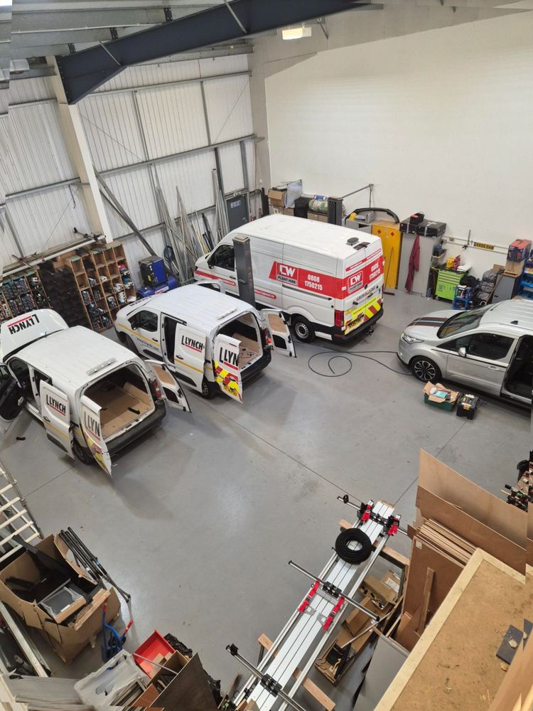 Vans lined up in the fit-out bays at the TAD Communications workshop in Hemel Hempstead